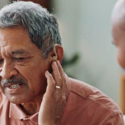 Man at doctor with hearing loss